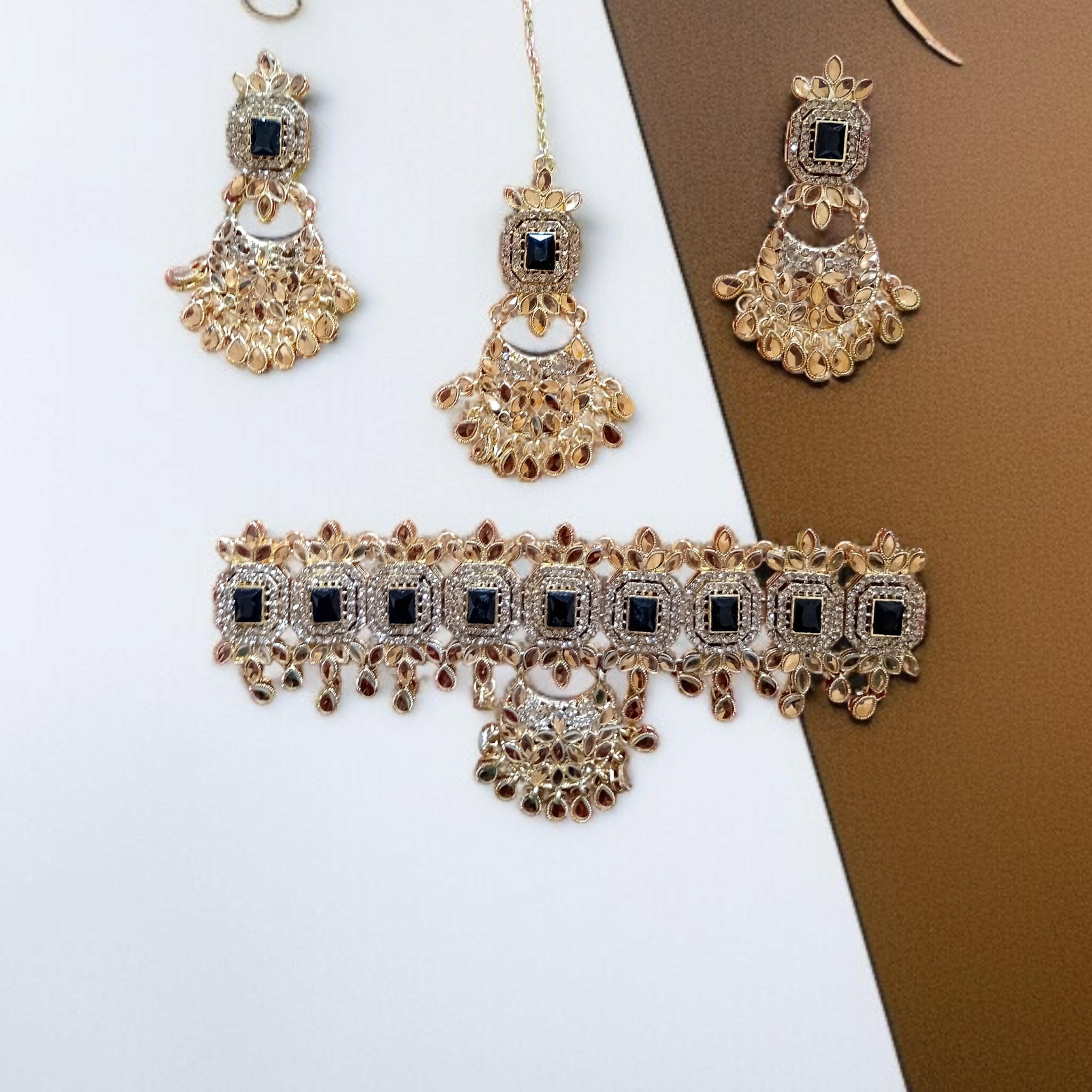 Buy Black and Golden colour jewellery set with necklace , earrings and tikka at best price in Pakistan